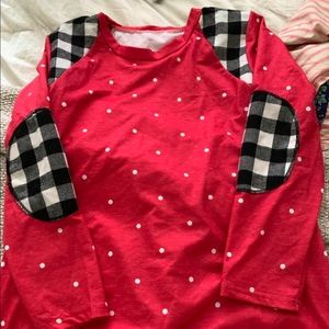 Red with white polka dot shirt